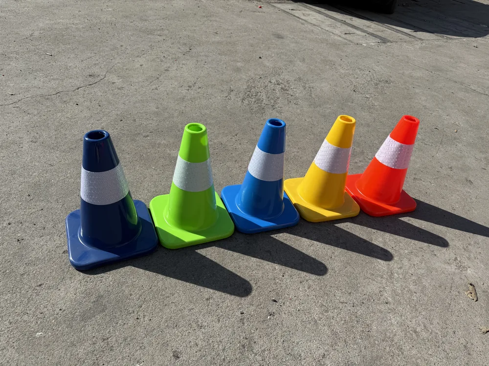 30cm PVC traffic cones available in many colours on white background